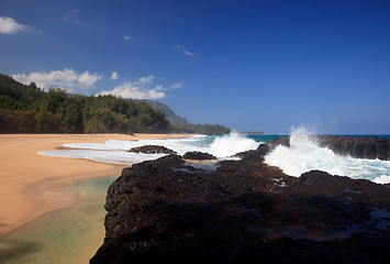 Image showing Waves over rocks on Lumahai