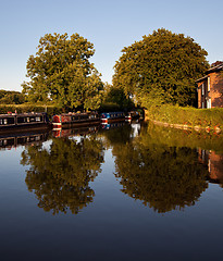 Image showing Canal barges reflected in the water