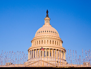 Image showing Rising sun illuminates the front of the Capitol building in DC