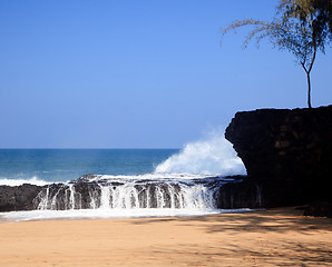 Image showing Waves over rocks on Lumahai