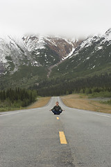 Image showing Sitting, meditating. On the road? Whatever