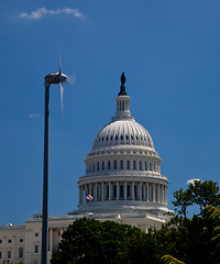 Image showing Capitol Building framed by wind turbine