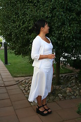 Image showing Lady in white