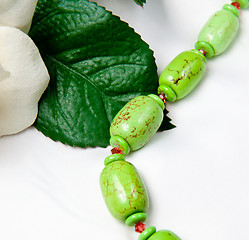 Image showing Close up of green home made beads