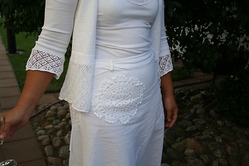 Image showing White dress with lovely pattern of the skirt