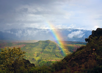 Image showing Rainbow over Waimea canyon in Kauai