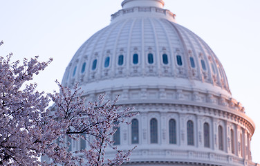 Image showing Sunrise behind the dome of the Capitol in DC