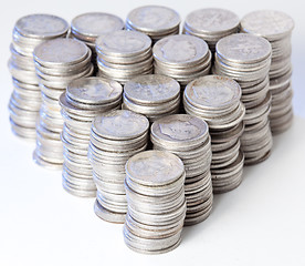 Image showing Stacks of pure silver coins