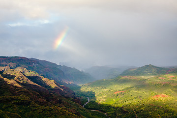 Image showing Rainbow over Waimea canyon in Kauai