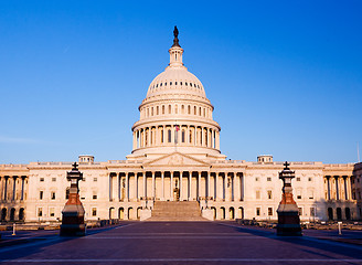 Image showing Rising sun illuminates the front of the Capitol building in DC