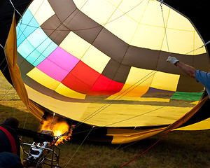 Image showing Hot air balloon inflation with flames