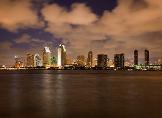 Image showing Orange clouds reflect light from San Diego Skyline