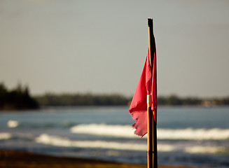 Image showing Red flag at sunset