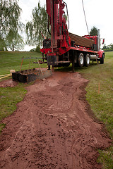 Image showing Drilling well in yard