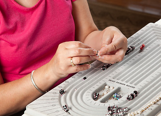 Image showing Making bead necklace