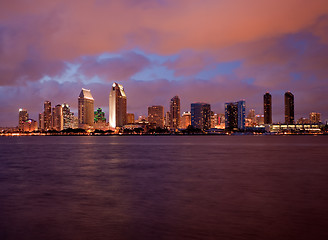 Image showing Orange clouds reflect light from San Diego Skyline