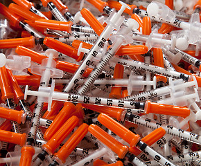 Image showing Close-up of used hypodermic syringes