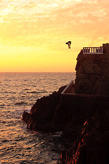 Image showing Cliff diver off the coast of Mazatlan at sunset