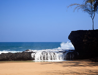 Image showing Waves over rocks on Lumahai