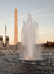 Image showing Washington Monument behind fountain at sunset