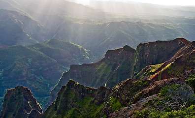 Image showing Bright light backlit rocks in Waimea Canyon