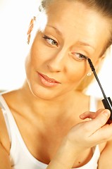 Image showing Girl doing makeup