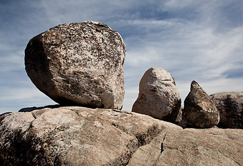 Image showing Three balanced boulders