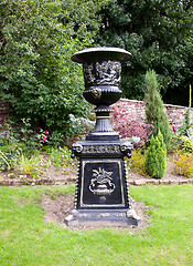 Image showing Ornate black garden vase