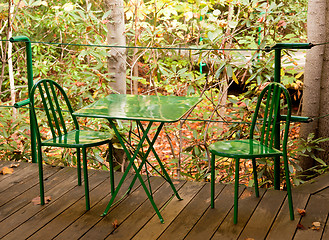 Image showing Green table and chairs