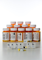 Image showing Vertical set of prescription drug bottles