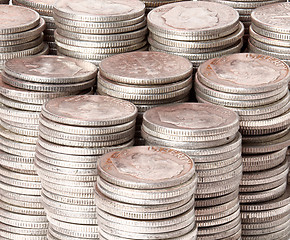 Image showing Stacks of pure silver coins