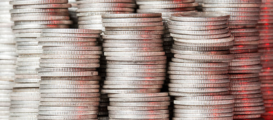 Image showing Stacks of pure silver coins