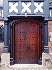 Image showing Ornate dark wood entrance door