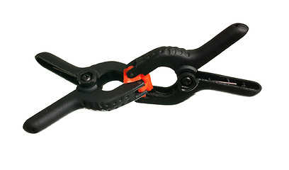 Image showing Two black spring clips