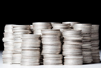 Image showing Stacks of pure silver coins