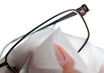 Image showing Cleaning glasses with cloth