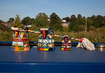 Image showing Hand painted traditional decorated watering cans