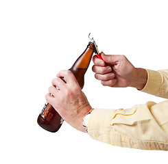 Image showing Cap being removed from beer bottle