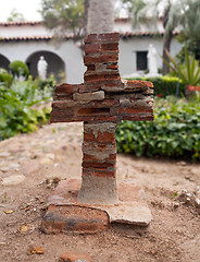 Image showing Old brick cross in Mission