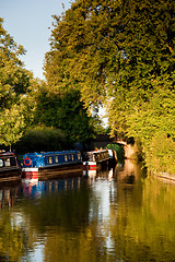 Image showing Canal Barges reflected in a calm canal