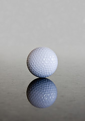 Image showing Single golf ball reflection