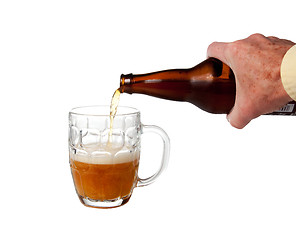 Image showing Beer being poured from bottle