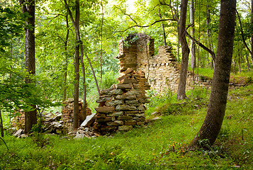 Image showing Old ruined mill in forest