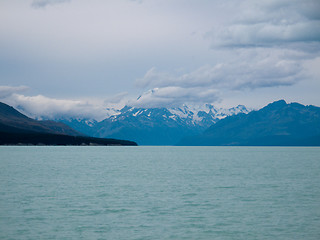 Image showing Mount Cook over a blue lake Tekapo