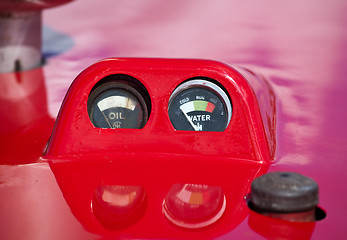 Image showing Old warning dials on tractor