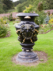 Image showing Ornate black garden vase