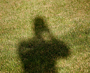 Image showing Photographer shadow on grass