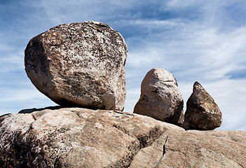 Image showing Three balanced boulders