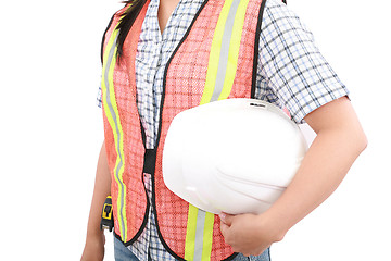 Image showing Engineer woman holding an helmet, isolated over white 