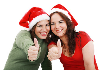 Image showing happy young Christmas girls make a sign OK